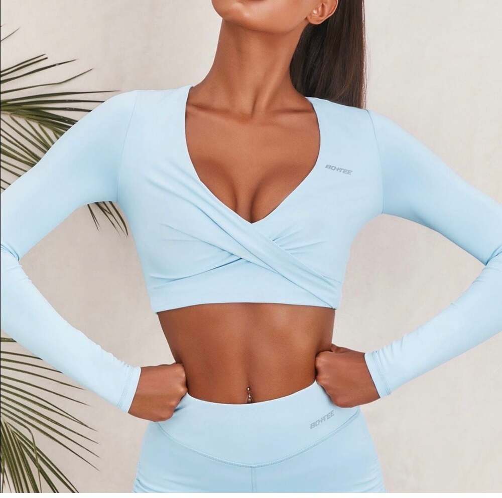 Bo+Tee Progress Long Sleeve Twist Front Crop Top in Ice Blue
